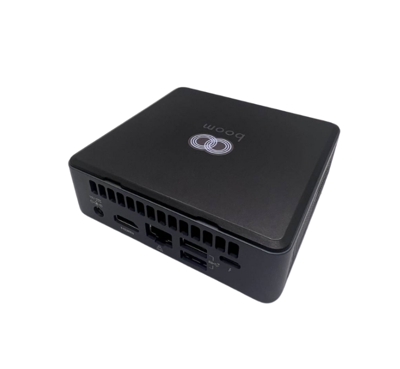 Angled view of the Boom CAPO, a compact Intel NUC Mini PC preloaded with Windows 11 Pro—designed as a powerful Zoom Room computing solution for seamless video conferencing performance in professional meeting spaces.