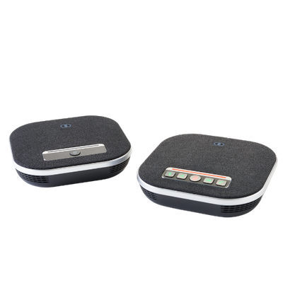 Top view of the Boom GEMINI dual speakerphone setup, featuring two sleek, wireless units designed for 48kHz wideband audio and 8-meter omnidirectional voice pickup—ideal for flexible audio coverage in medium to large meeting rooms.








